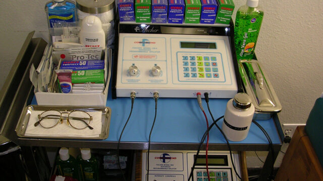 Electrology probe and computerized epilator prepared for treatment.